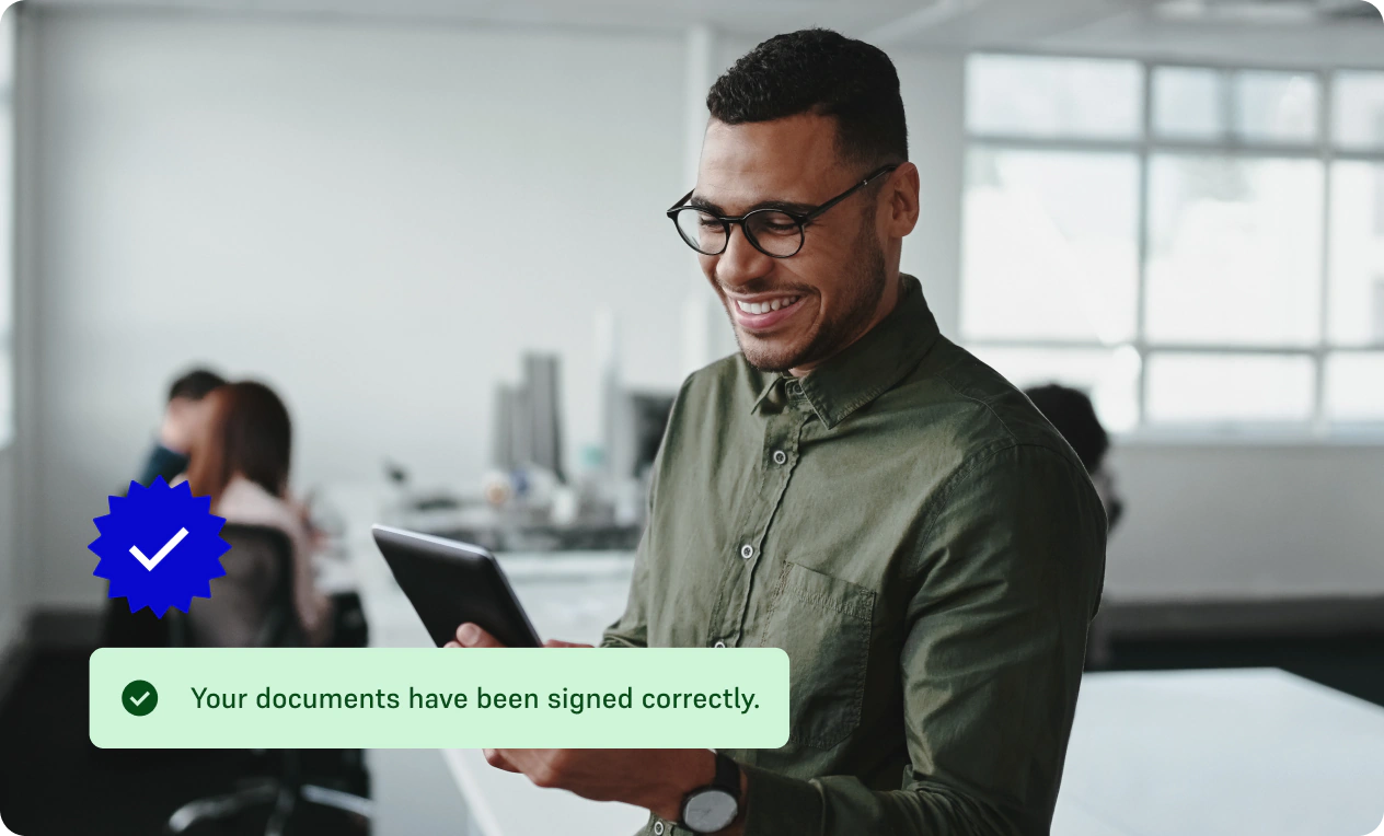Man viewing signed documents on a tablet